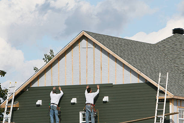 Professional Siding Contractor technician working in Columbia, VA
